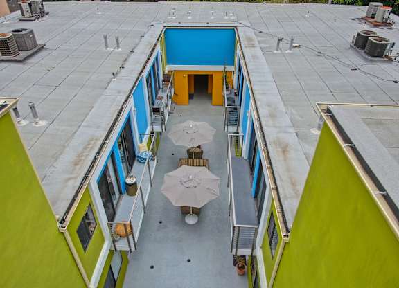 Drone photo of above the community common area in the middle of the complex at Croft Plaza Apartments, West Hollywood.