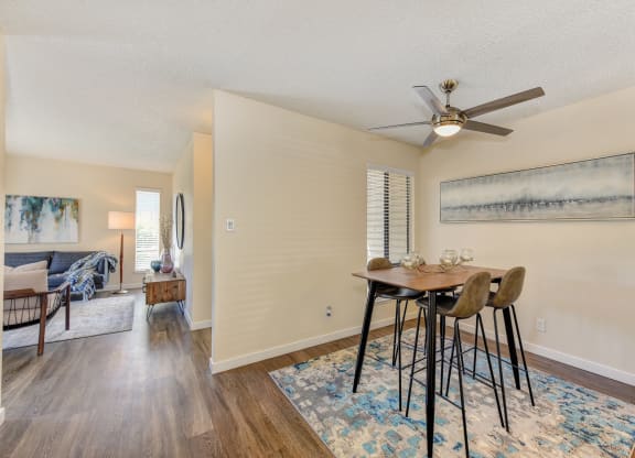 Dining Area, Ceiling Fan, Hardwood Inspired Floor, and Rug at Silverstone Apartments, Davis ,95618