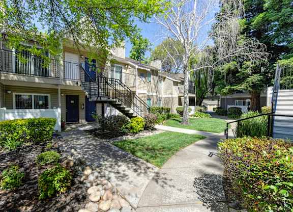 Exterior Walkways with View of Private Patios at Hidden Oaks Apartments, Citrus Heights