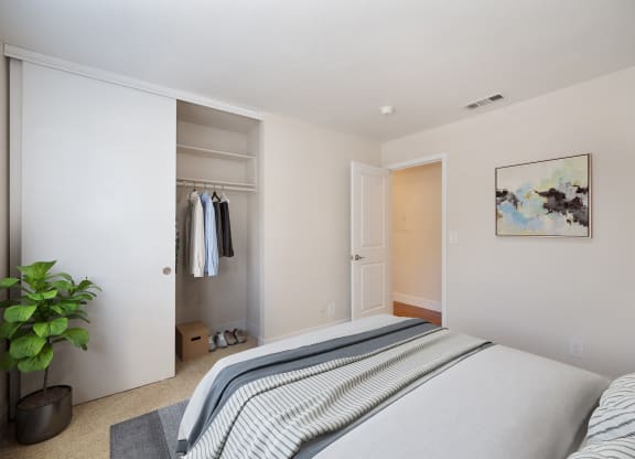 a bedroom with a bed and a closet at Folsom Ranch, Folsom, 95630