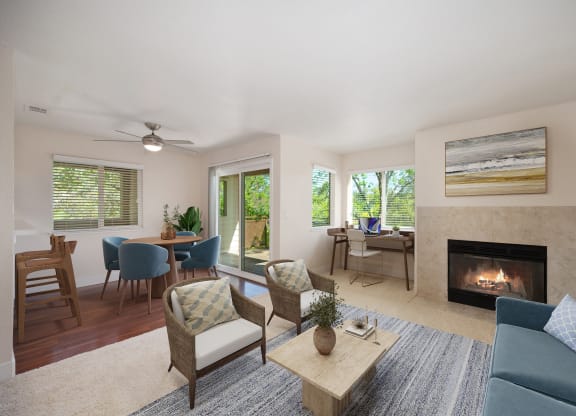 a living room with a fireplace and a table with chairs at Folsom Ranch, California, 95630
