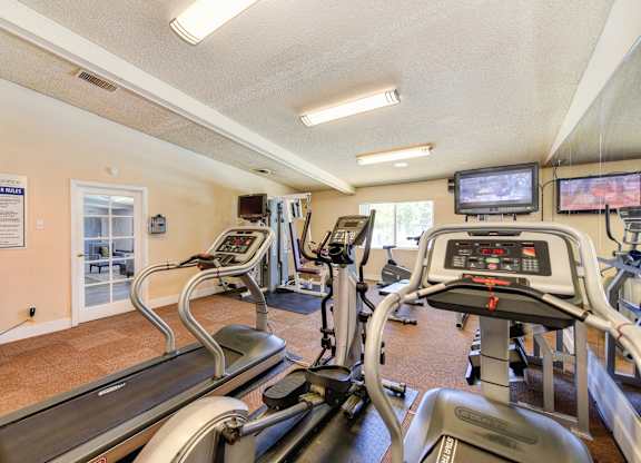Fitness Center with Treadmills, Tv and Vending Machine.at The Renaissance Apartments, Citrus Heights, CA 95610