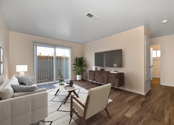 Hastings Park Model home living room with hardwood inspired flooring through out 