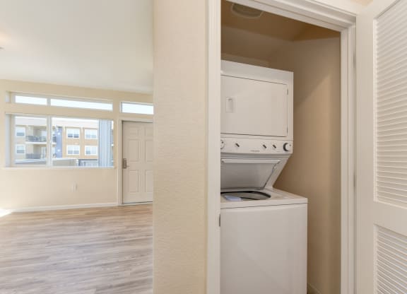 In Unit Washer/Drye, Hardwood Inspired Floors, View of Window at Addison Ranch Apartments, California, 94954