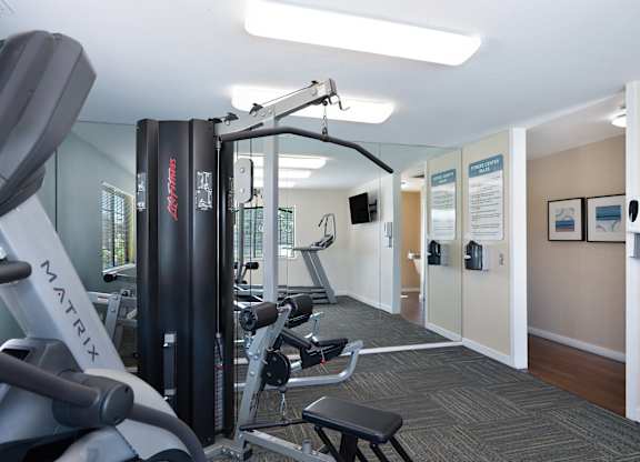 A Gym with a Rowing Machine at Rocklin Manor Apartments, California, 95677