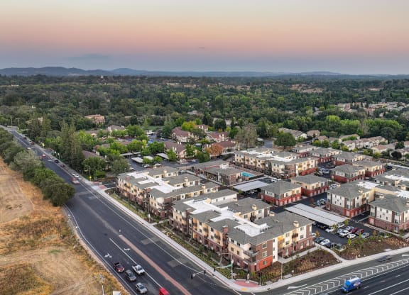 an aerial view of Sierra Gateway Apartment complex at dusk way