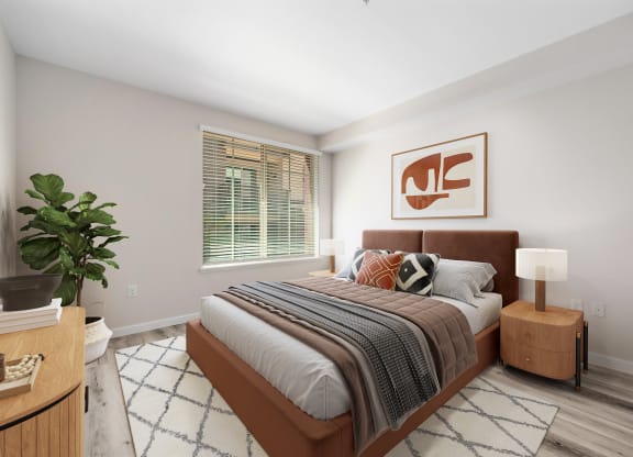a bedroom with a large bed in a 555 waverly unit