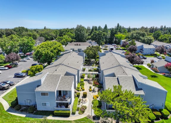 a aerial view of several houses in a neighborhood with trees at Silverstone Apartments, Davis, CA, 95618