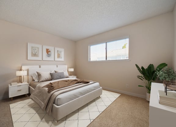 a bedroom with a bed and a window at Silverstone Apartments, California