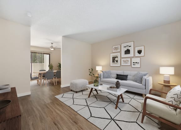 The entrance view of the living room and dining room to the townhome floor plan at Silverstone Apartments at Silverstone Apartments, Davis, CA