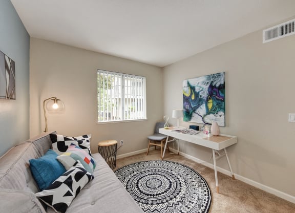 Spare Bedroom with Desk, painting and window with Black/White designed Rug at Addison Ranch Apartments, Petaluma
