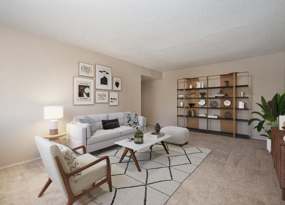 an open living room with a couch and a table