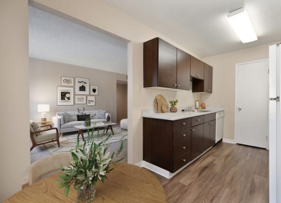 our apartments offer a kitchen and living room with a table