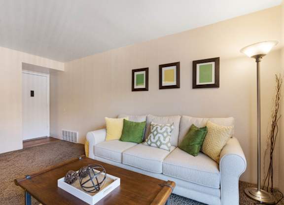 a living room with a couch and a coffee table