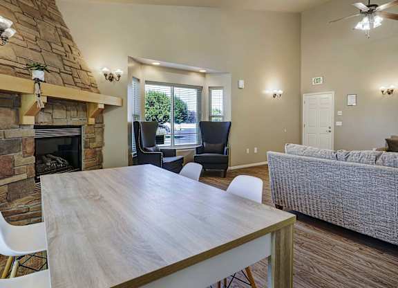 A living room with a fireplace and a couch.