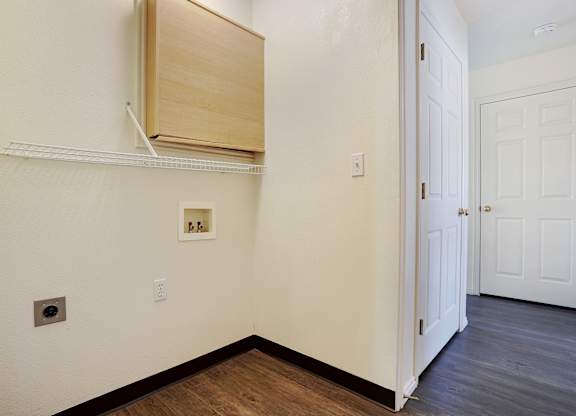 A white door is on the right side of the image.