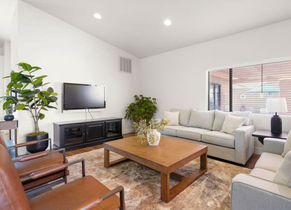 a living room with a couch and a table