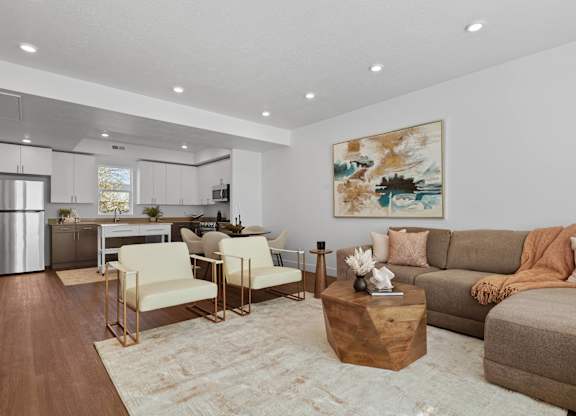 a living room with a couch and a table