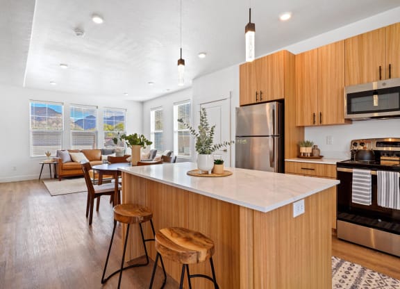 Kitchen with wooden closet at Current by Lotus, Ogden, UT, Utah