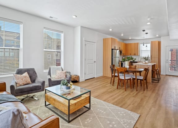 Living Room With Oversized Windows And Dining area at Current by Lotus, Ogden, 84401