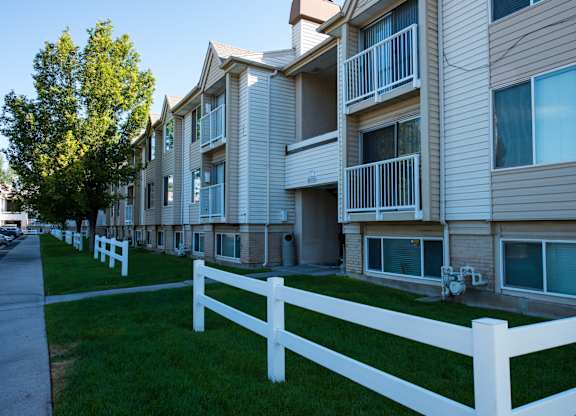 an exterior view of a building at the whispering winds apartments in pearland