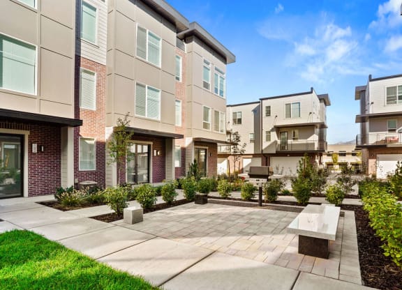 Grilling area and courtyard at Greens by Lotus Townhomes, Utah , 84403