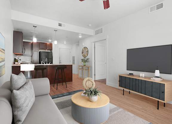 a living room with a couch and a tv
