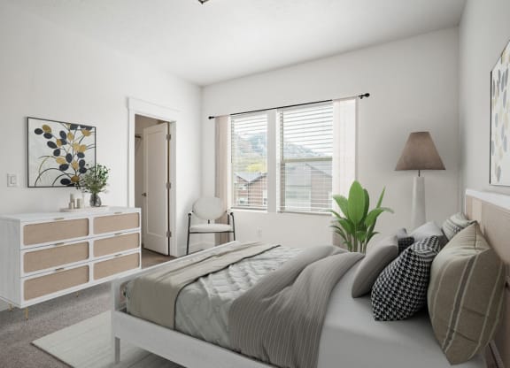 a bedroom with a bed and a dresser