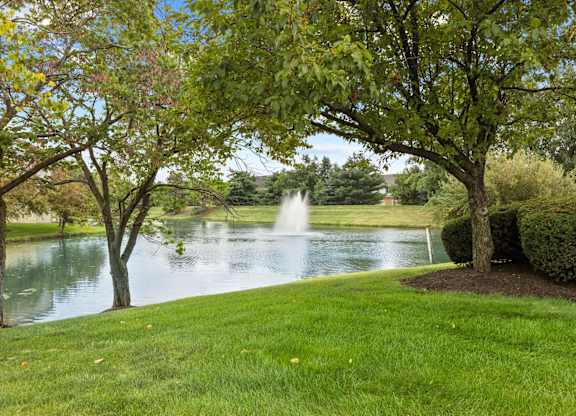 Green Spaces With Mature Trees at Lakes of Carmel Apartments, Carmel, IN
