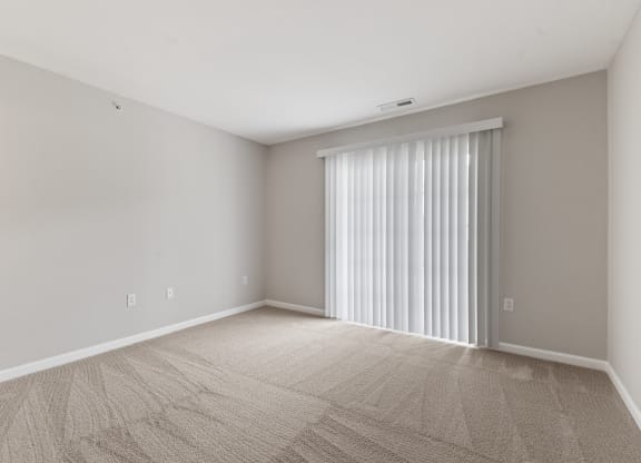 Primary Bedroom with Balcony at Aspen Lakes Apartments, Indianapolis, IN