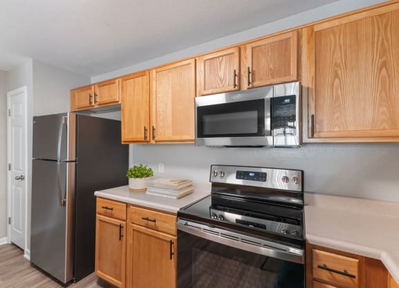 Kitchen with Updated Stainless Appliances at Aspen Lakes Apartments, Indianapolis