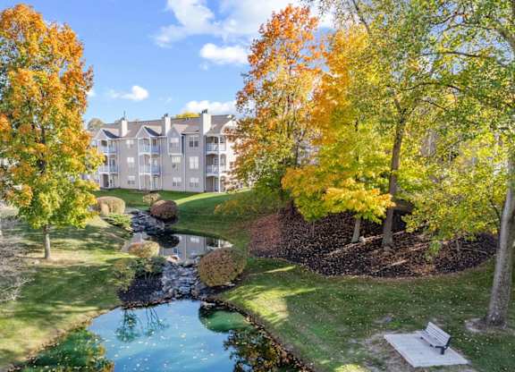 Park with a pond at Sand Creek Woods Apartments, Indiana