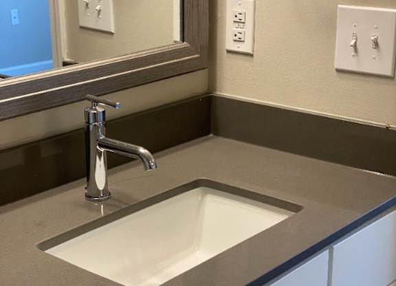 Bathroom with Quartz Counter tops at Sand Creek Woods Apartments, Indiana