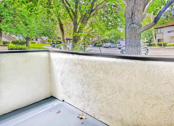 Village Park Apartments Patio with View of Trees