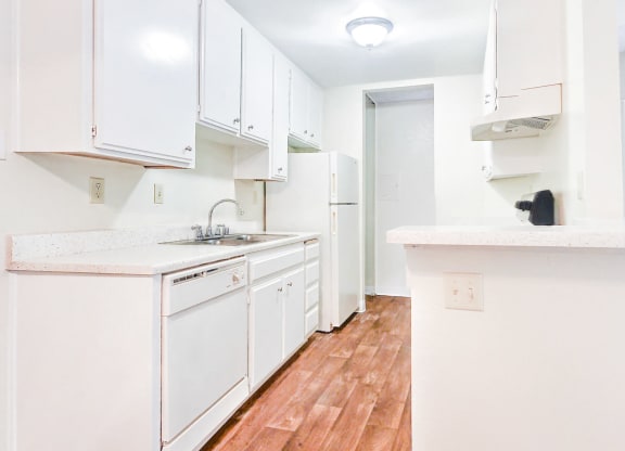 Village Park Apartments Kitchen with White Appliances For Rent