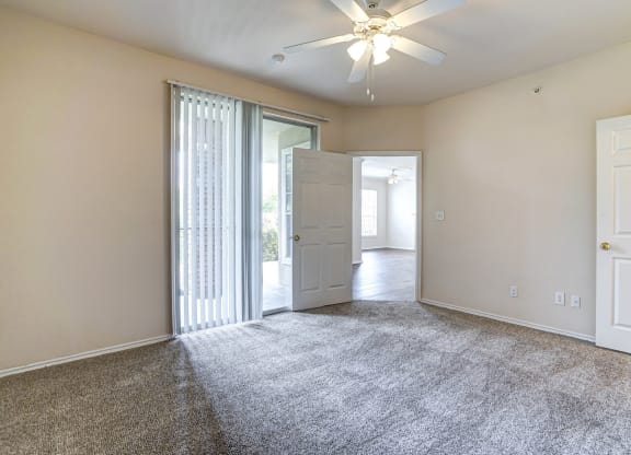 Spacious and bright bedrooms at Turnberry Isle Apartments in Dallas, TX.