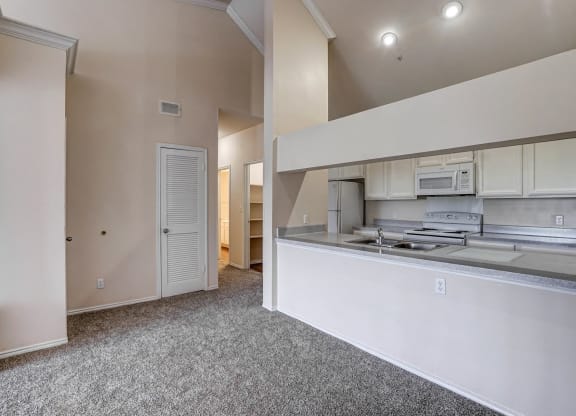 Large kitchens with ample countertop space at Turnberry Isle Apartments in Dallas, TX.
