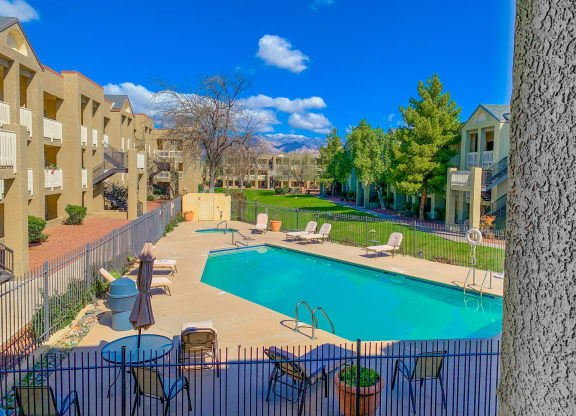 the swimming pool at the enclave apartments