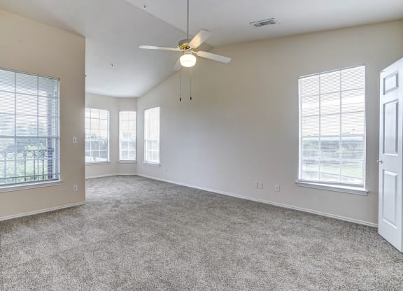 Bright and spacious bedrooms at Turnberry Isle Apartments in Dallas, TX.