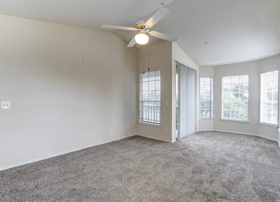 Bright and spacious bedrooms at Turnberry Isle Apartments in Dallas, TX.