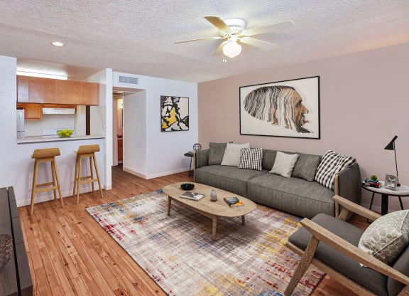 a living room with a couch and a table