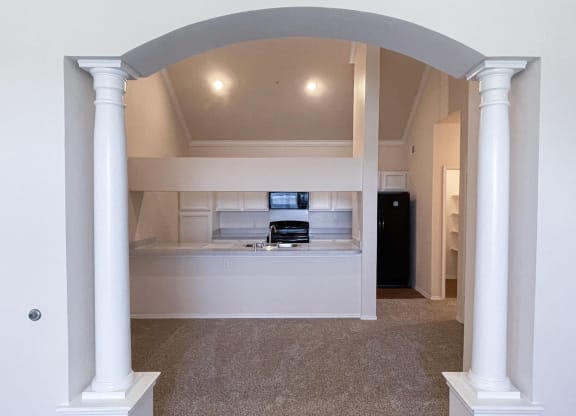 Large archways in select floorplans at Turnberry Isle Apartments in Dallas, TX.