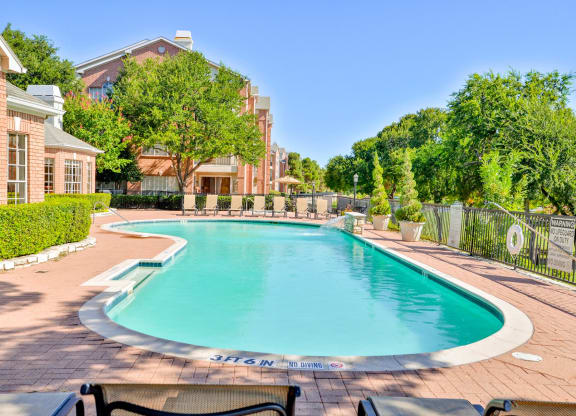 Enjoy a cool swim in our sparkling pool with golf course views at Turnberry Isle Apartments in Dallas, TX offers 1,2 and 3 Bedroom Apartment Homes.