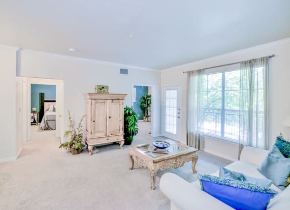 a living room with a couch and a table