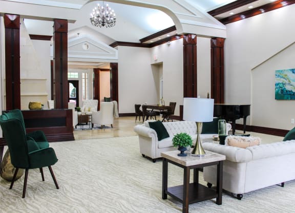 Leasing Office at Montfort Place Apartments. Two large couches and two lounge chairs. Montfort Place in North Dallas, TX, For Rent. Now leasing 1 and 2 bedroom apartments.