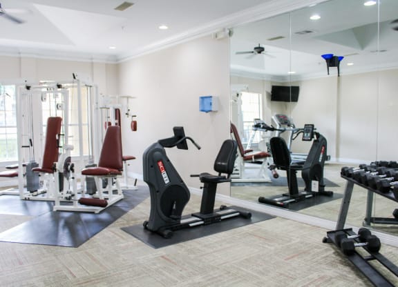 Montfort Place fitness center. Two cable machines, one exercise bike. Montfort Place in North Dallas, TX, For Rent. Now leasing 1 and 2 bedroom apartments.