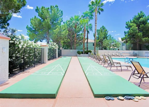 Shuffleboard poolside at Country Club at Valley View Senior Apartments in Las Vegas, NV, For Rent. Now leasing 1 and 2 bedroom apartments.