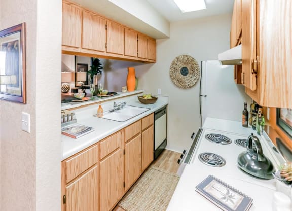 Pass through kitchen of Country Club at Valley View Senior Apartments in Las Vegas, NV, For Rent. Now leasing 1 and 2 bedroom apartments.