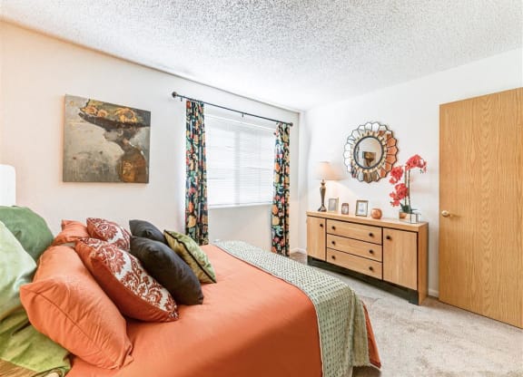 Bright bedroom at Country Club at Valley View Senior Apartments in Las Vegas, NV, For Rent. Now leasing 1 and 2 bedroom apartments.