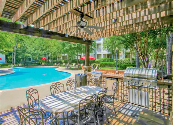 Dine poolside at The Remington at Memorial in Tulsa, OK, For Rent. Now leasing 1 and 2 bedroom apartments.